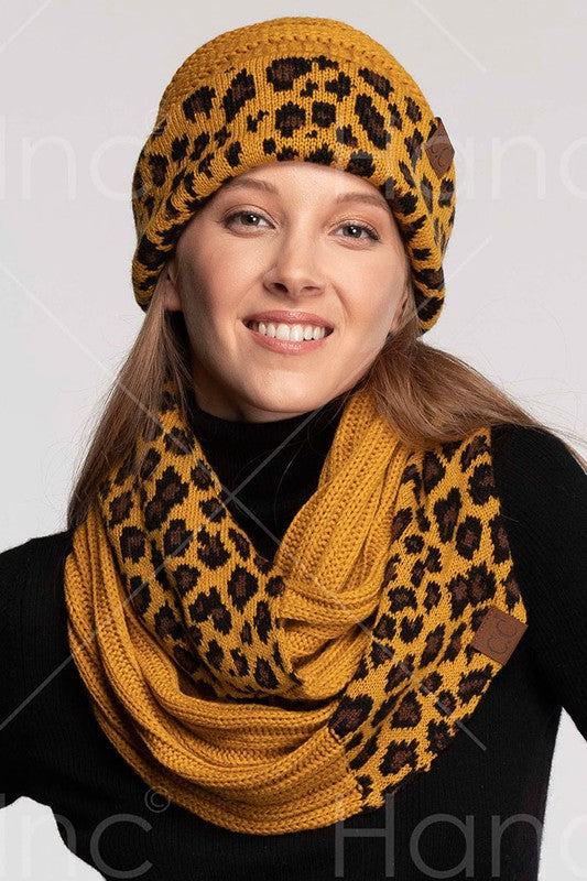 mustard infinithy scarf with leopard print  ponytail hat