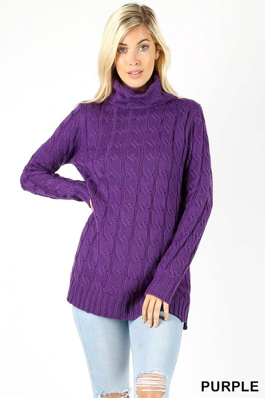 purple cable knit sweater featuring a cowl neckline