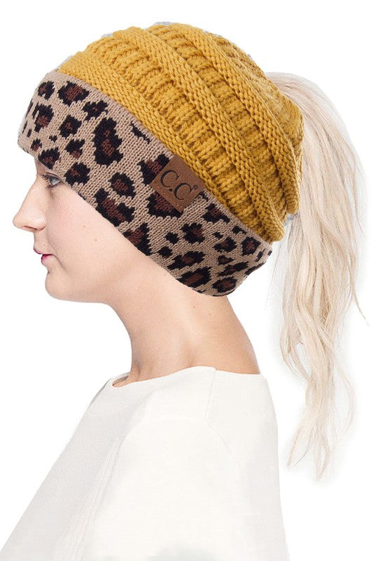 mustard hat with leopard print band ponytail hat