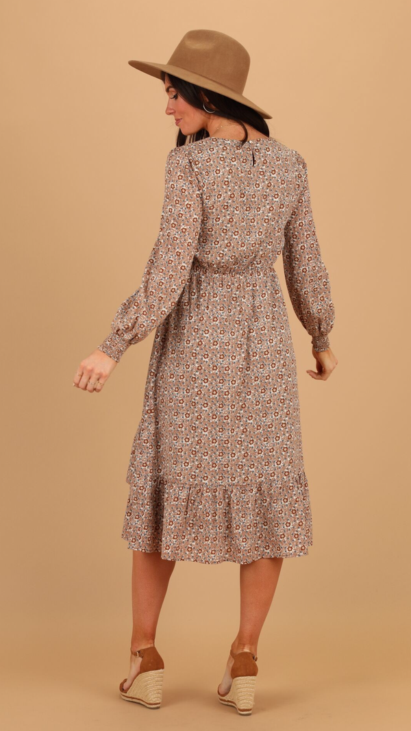 beige print dress with double ruffle hem and long sleeves